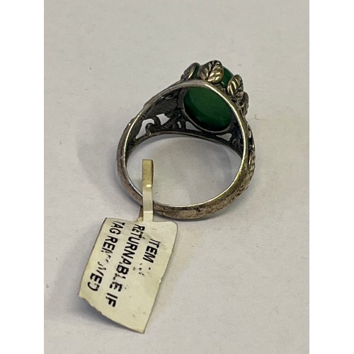 28 - A SOLID SILVER RING WITH LARGE GREEN STONE SIZE Q NEW WITH TAG