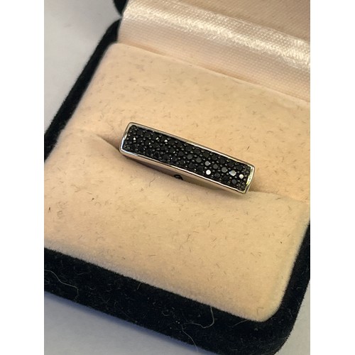 31 - A SOLID SILVER AND BLACK DIAMOND RING SIZE K MADE IN JAIPUR NEW WITH TAG