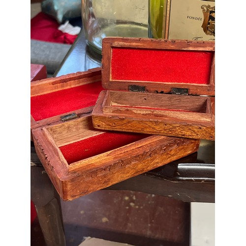 269 - 2 GRADUATING CARVED WOODEN BOXES