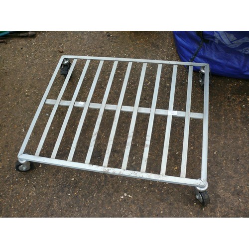 308 - MOVING METAL FRAMED DOLLY ON LOCKABLE CASTERS, APPROX 2FTX2.6FT