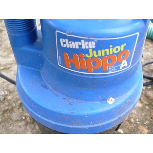 324 - SMALL SUBMERSIVE PUMP WITH FLOAT SWITCH AND DISCHARGE HOSE, IT'S A CLARKE JUNIOR HIPPO