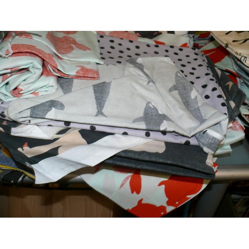 297 - 3 STACKS OF VARIOUS FABRIC OFFCUTS MOSTLY ANIMAL DESIGNS