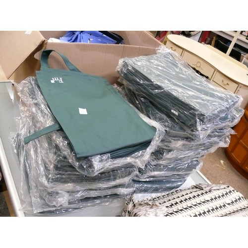 287 - VERY LARGE QUANTITY OF NEW GREEN APRONS