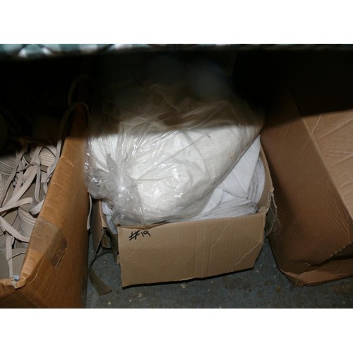 338 - LARGE BOX OF REELS OF FABRIC EDGING AND A BOX OF STUFFING READY CUT