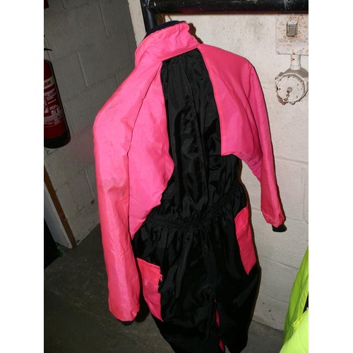 358 - 2 ADULT FLYING SUITS IN PINK AND FLUORESCENT YELLOW