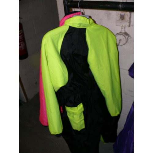 358 - 2 ADULT FLYING SUITS IN PINK AND FLUORESCENT YELLOW