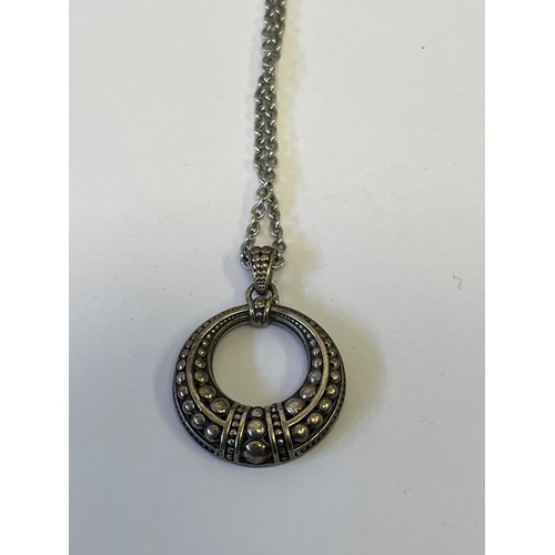 37 - A HEAVY SOLID SILVER ETHNIC PENDANT ON 24 INCH CHAIN