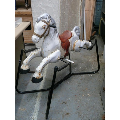 288A - 1960's Mobo Prairie King rocking horse, pressed metal on a sprung tubular frame.