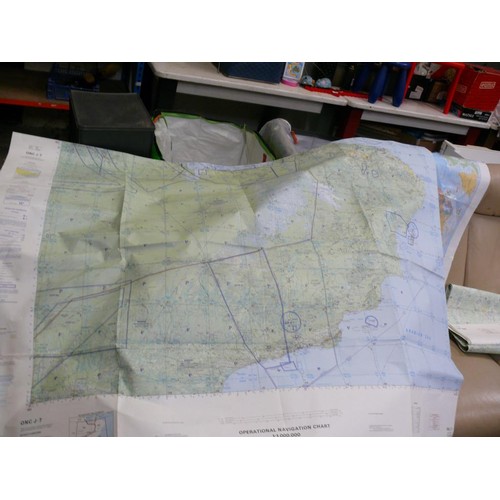 417 - 4 LARGE OPERATIONAL NAVIGATION CHARTS AND A MAP OF THE WORLD