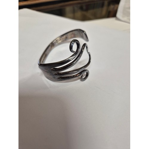 50A - A SILVER PLATED BANGLE CREATED FROM A DINNER FORK