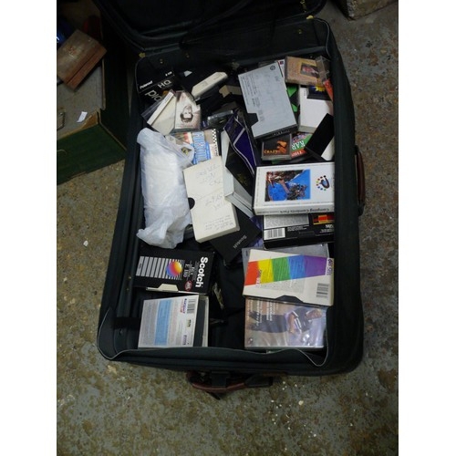 153 - SUITCASE FULL OF OF VHS TAPES AND CASSETTES