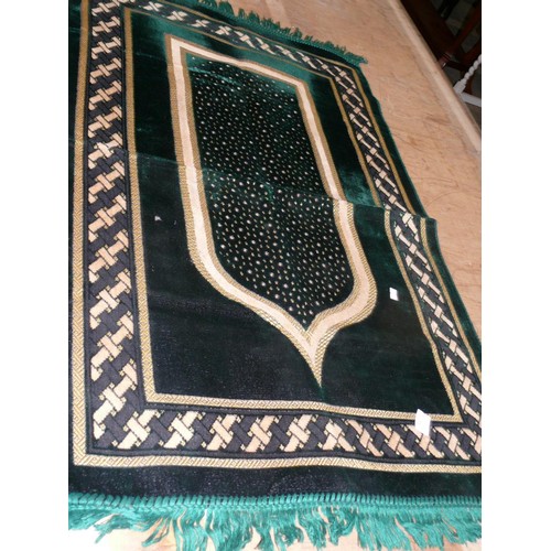 215 - ISLAMIC PRAYER RUG IN GREEN VELVET TYPE FABRIC