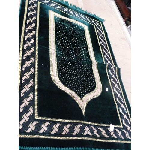 215 - ISLAMIC PRAYER RUG IN GREEN VELVET TYPE FABRIC