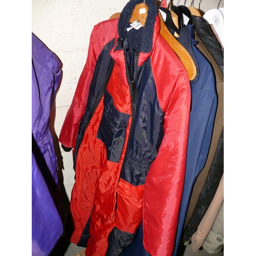 359 - 2 CHILDRENS FLYING SUITS IN PURPLE AND RED