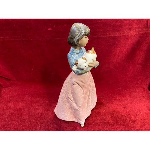 130 - 'Puppy Fun' Lladro Nao porcelain figurine. Gres (matte) finish, model number 11207.