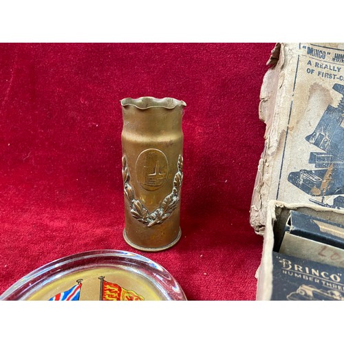 153 - Brass trench art shell case from Ypres, together with a commemorative coronation paperweight for Kin... 