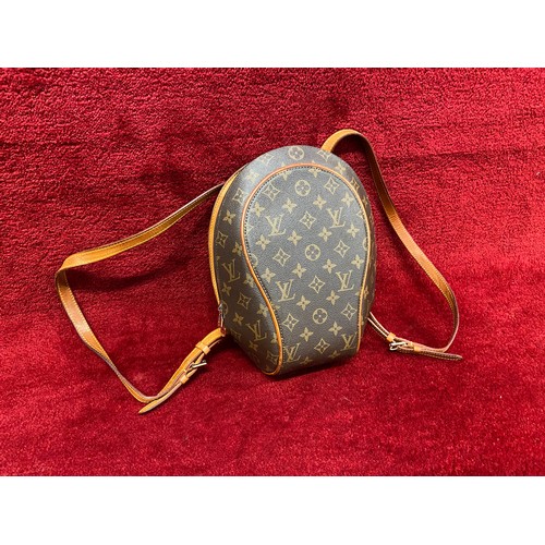 164 - An 'LV' mini backpack. Decent copy of Louis Vuitton.