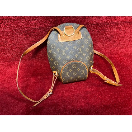 164 - An 'LV' mini backpack. Decent copy of Louis Vuitton.