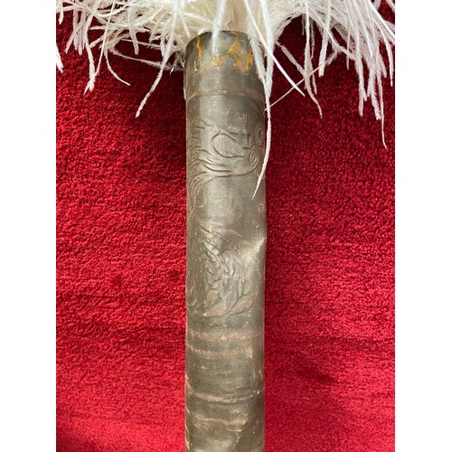 177 - Antique tin tube embossed with a cockerel holding a key, containing 3x Ostrich feather plumes.