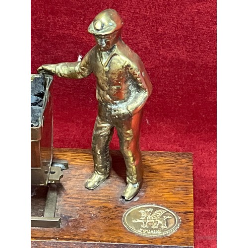 5 - A BRASS DEPICTION OF VINTAGE WELSH MINER WITH HIS COAL CART OR DRAM IN WALES PLUS HIS DAVY LAMP