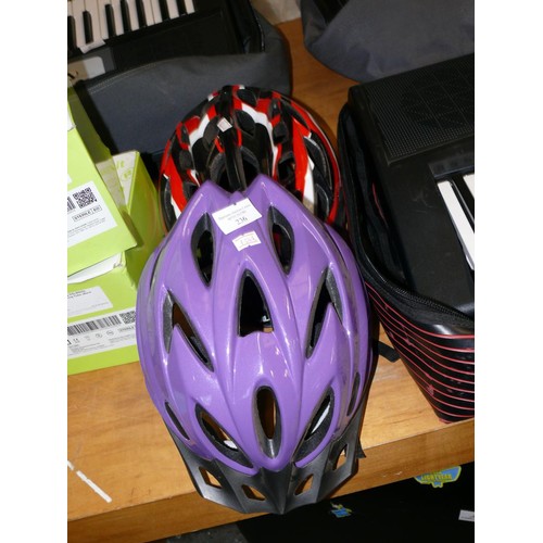 236 - 2 CYCLE HELMETS, ONE PURPLE & ONE RED/BLACK