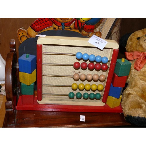 426 - 1950'S TEDDY BEAR WITH GOLD PLUSH AND METAL NOSE AND A WOODEN ABACUS