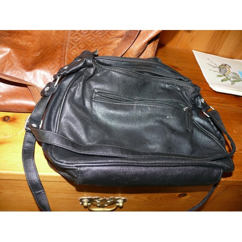 460 - BROWN LEATHER HANDBAG AND A BLACK HANDBAG