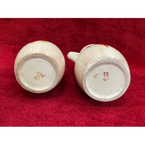 195 - Pair of vintage Bewley pottery hand painted Art Deco jugs. 25cm tall.