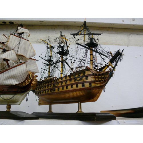 92 - A LARGE MODEL OF A WORLD WAR 1 BI-PLANE AND 2 MODELS OF GALLEON SHIPS