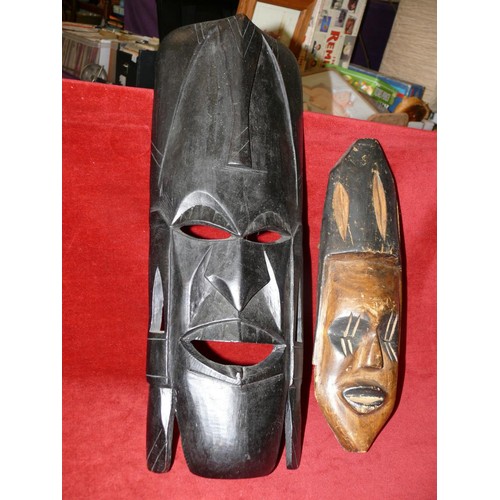 102 - 2 WOODEN TRIBAL MASKS