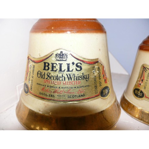 81 - SET OF 3 GRADUATING WADE BELLS WHISKY DECANTERS