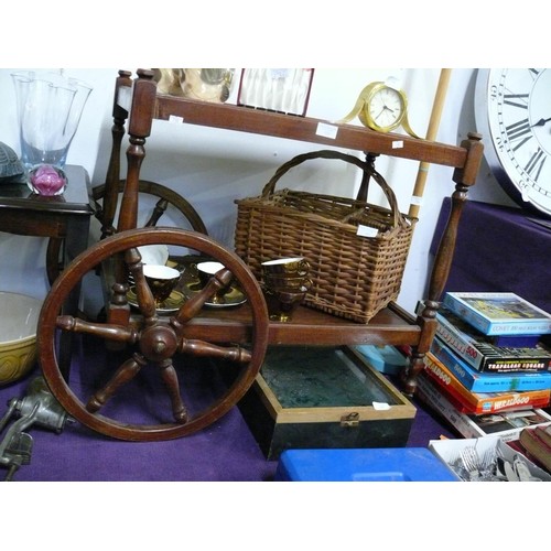 133 - A VINTAGE TILE TOPPED TEA TROLLEY WITH WAGON WHEELS TO ONE END