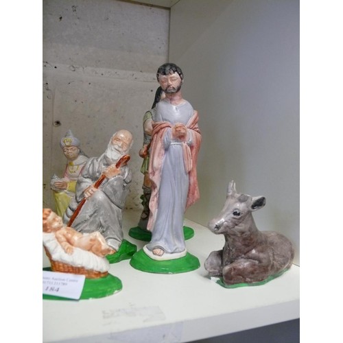 184 - DECORATIVE NATIVITY SCENE WITH 10 SEPERATE FIGURES