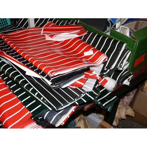 278 - LARGE QUANTITY OF VINYL FABRIC IN RED OR BLACK AND WHITE STRIPE