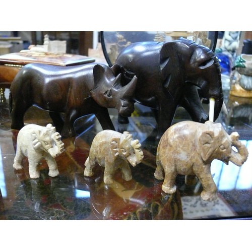 297 - 3 SETS OF ANIMAL FIGURES MOSTLY ELEPHANTS PLUS A RHINO