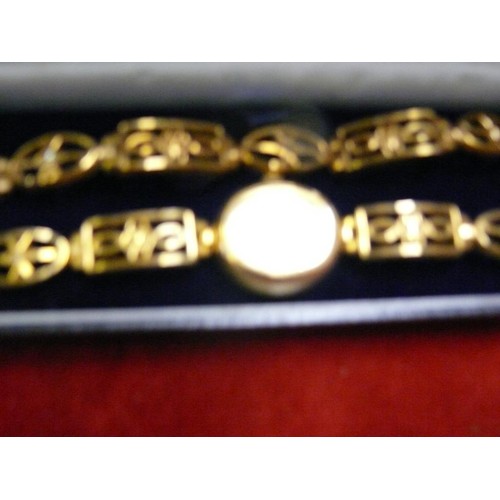 7 - LADIES SEKONDA WRIST WATCH & BRACELET SET - GOLD PLATED. THE STRAP & BRACELET SET WITH DIAMANTE