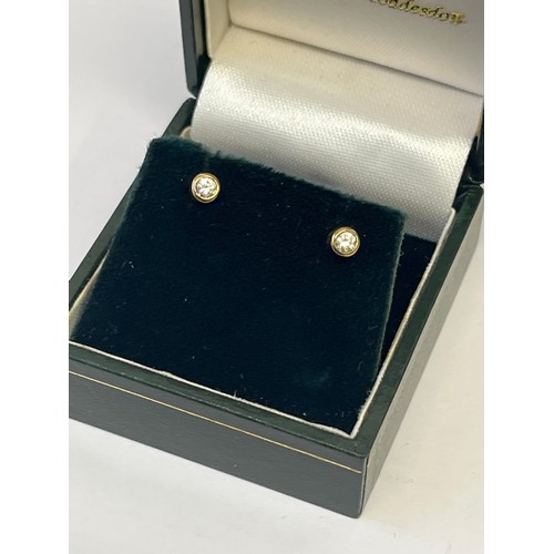 34 - A PAIR OF 9CT GOLD WITH WHITE STONES WEIGHT .8GR