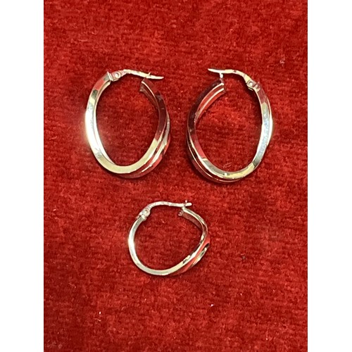 43 - PAIR 9CT WHITE GOLD HOOP EARRINGS AND A FURTHER 9CT WHITE GOLD ODD EARRING