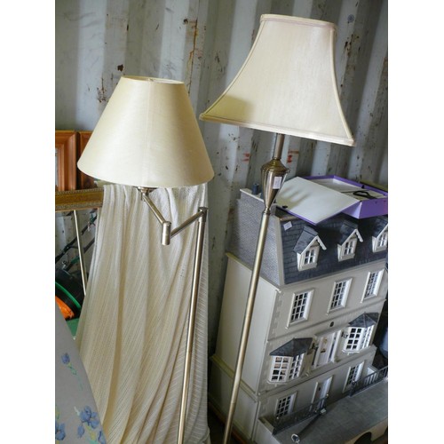 411 - 2 BRASS EFFECT STANDARD LAMPS ONE OF WHICH HAS AN ADJUSTABLE ARM