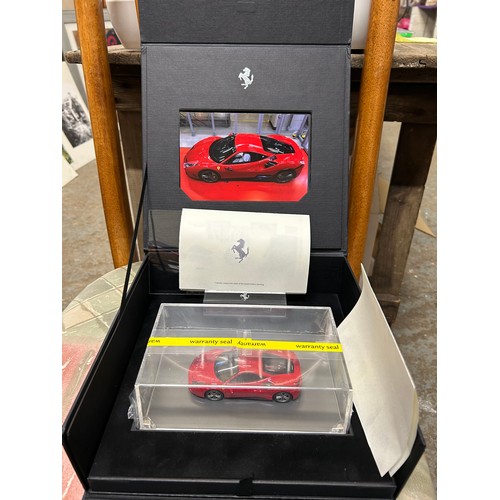 15 - A SUPERB FERRARI OFFICIAL PRODUCT 812 SUPERFAST DIE CAST MODEL CAR IN RED WITH A STAND AND PRESENTAT... 