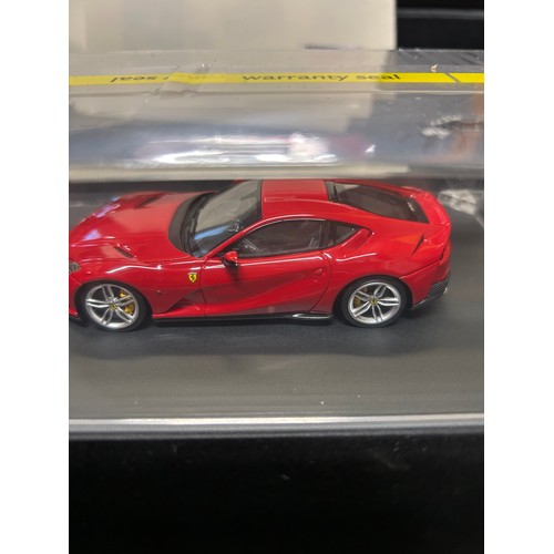 14 - A SUPERB FERRARI OFFICIAL PRODUCT 812 SUPERFAST DIE CAST MODEL CAR IN RED WITH A STAND AND PRESENTAT... 