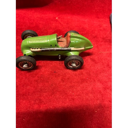 84A - AN ORIGINAL 1930'S SCHUCO STUDIO CLOCKWORK CAR IN GREEN - MADE IN GERMANY AND AN EMPR0 MODEL 209 ELA... 