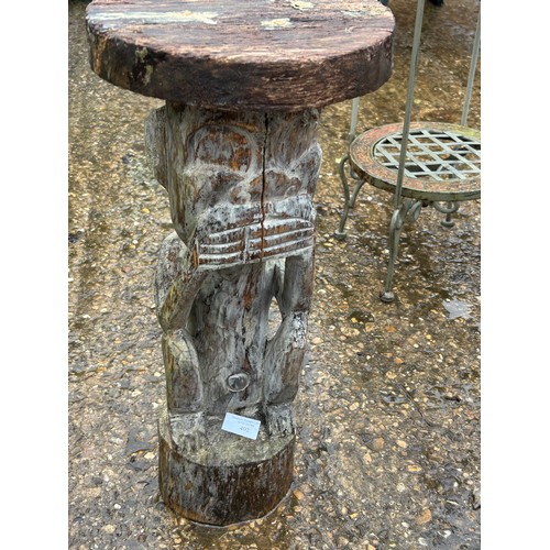 402 - Small carved African outdoor drink table