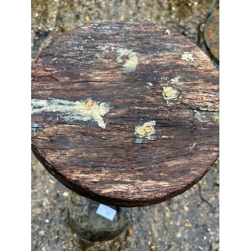 402 - Small carved African outdoor drink table