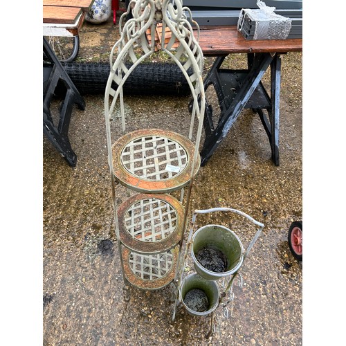 408 - Ornate wrought metal plant stand and a plant pot stand