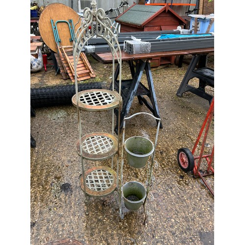 408 - Ornate wrought metal plant stand and a plant pot stand