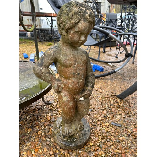 415 - Artificial stone fountain of a peeing cherub in the antique style