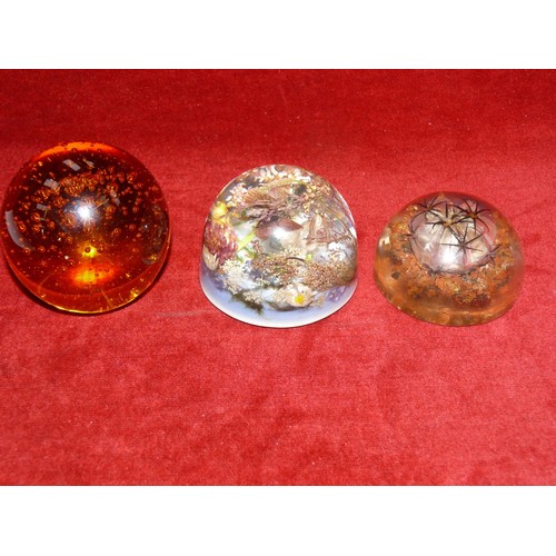 33 - Vintage amber bubble glass paperweight, together with 2x pyrex floral paperweight domes.