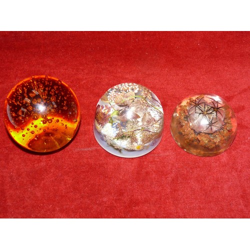 33 - Vintage amber bubble glass paperweight, together with 2x pyrex floral paperweight domes.