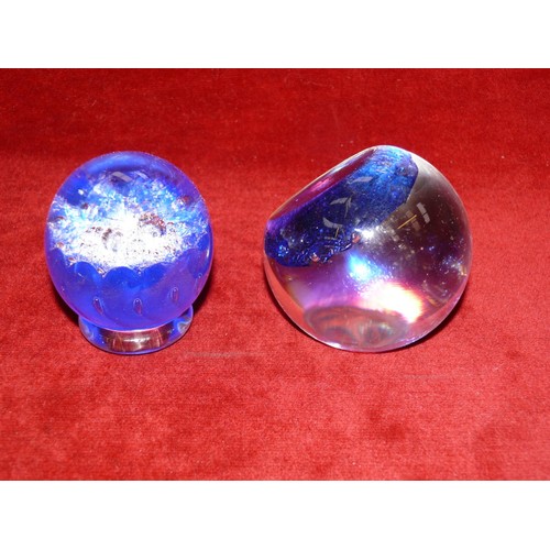 32 - Pair of vintage glass paperweights with blue bubble decoration. The larger has a flat top panel etch... 